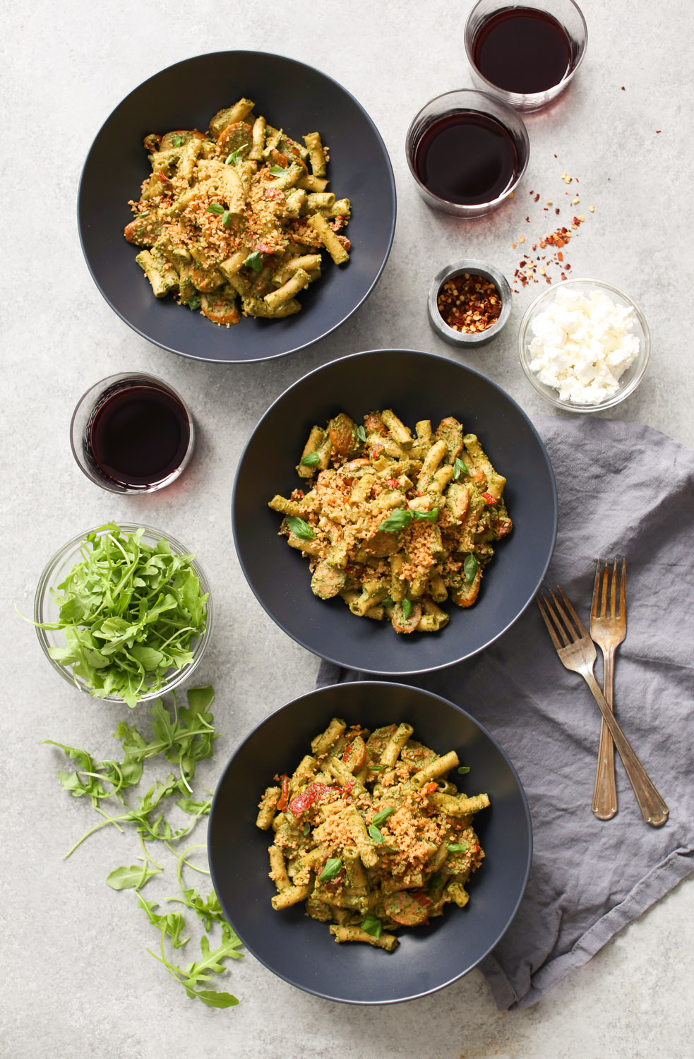 Sausage and Sun-Dried Tomato Pasta with Arugula-Goat Cheese Pesto