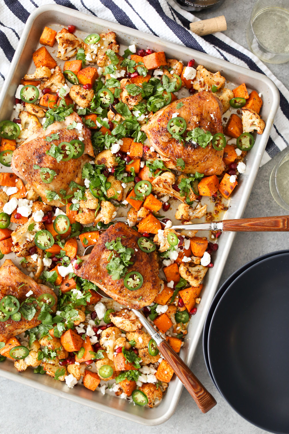 Sheet Pan Chicken Thighs with Cauliflower, Sweet Potatoes, and Pomegranate